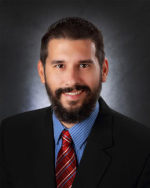 Charles M. Budde Esq.